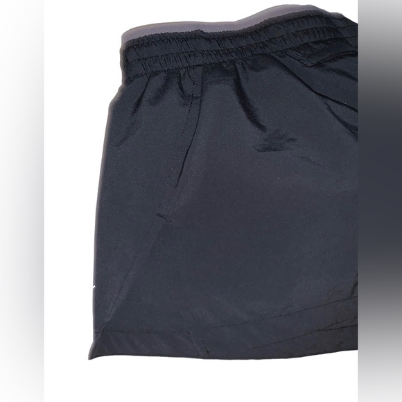 Nike Dri-Fit lined athletic running back zip pocket shorts women’s size medium - Picture 2 of 13